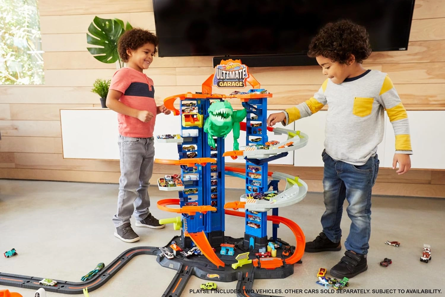 Hot Wheels Ultimate Garage Track Set with 2 Toy Cars with Multi-Level Side-by-Side Racetrack, Storage for 100  1:64 Scale Vehicles For Kids Ages 5 And Up