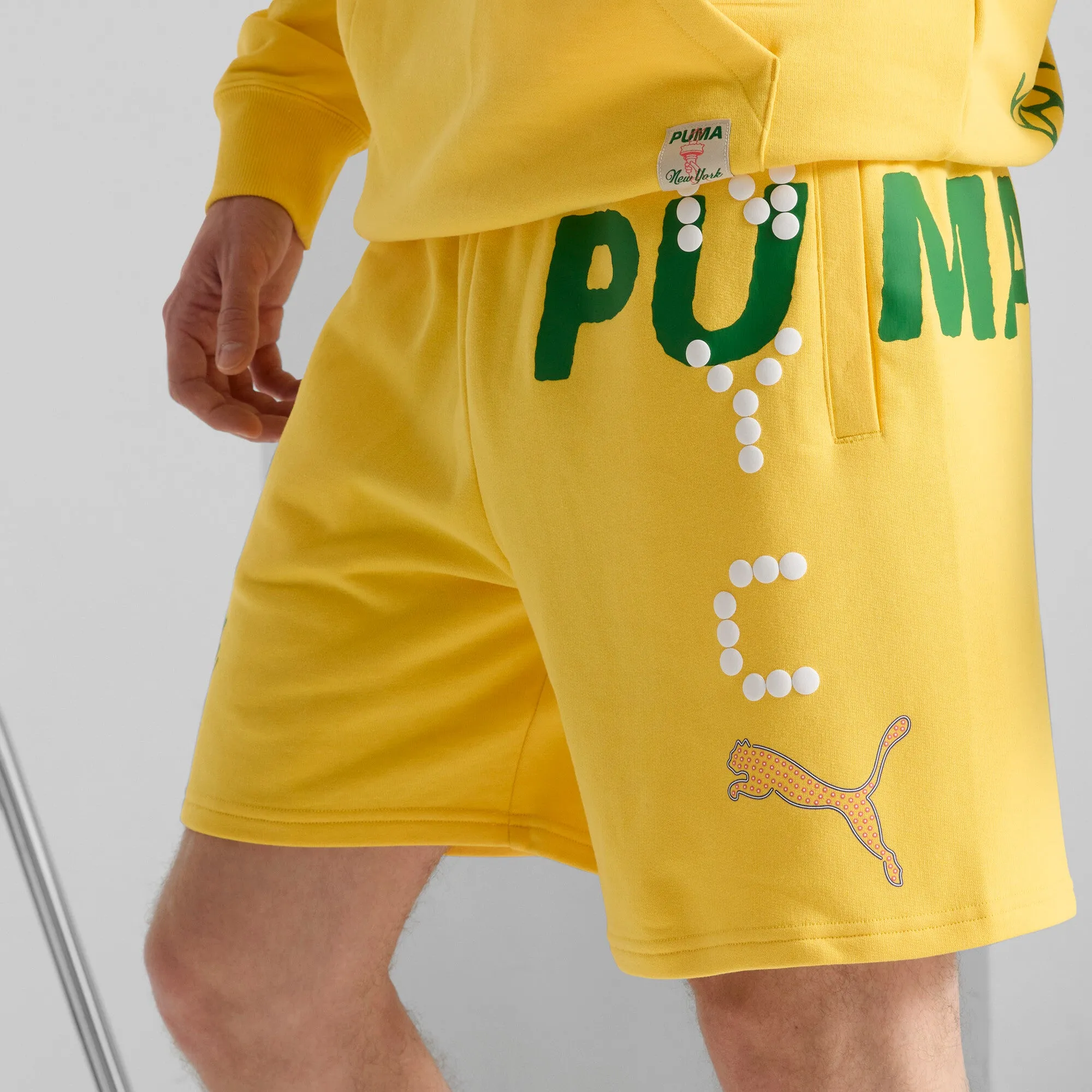 PUMA Men's Wardrobe Essentials Bright Lights NYC Flagship 7" Shorts